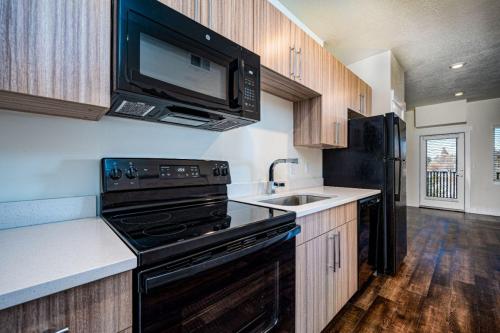 Studio Apartments in Clearfield, Utah-Apartment-Kitchen-with-View-to-Living-Space