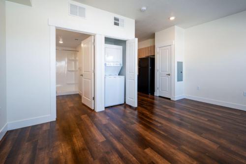 Studio Apartments in Clearfield, Utah-Living-Space-view-to-Bathroom-and-Laundry-Closet